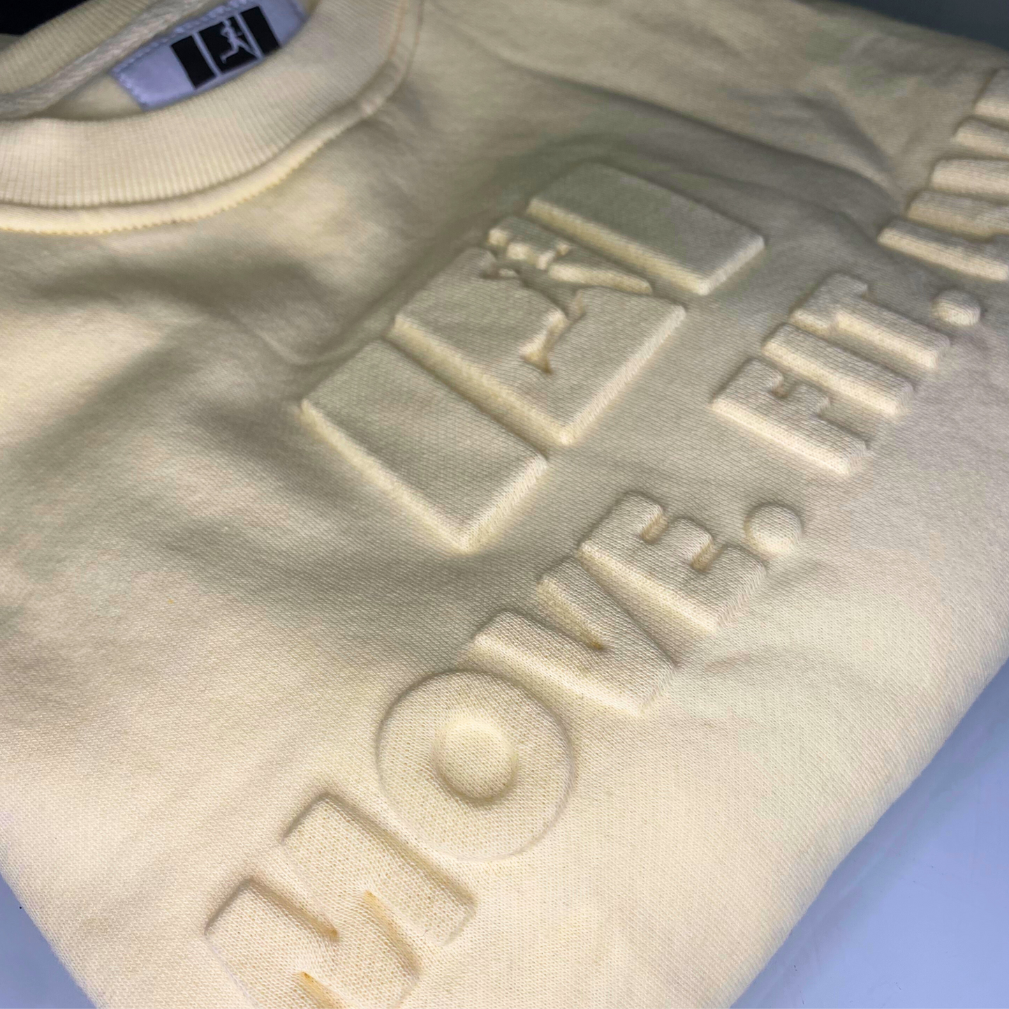 Custom Debossing for apparel clothing, sweatshirts, hoodies, t-shirts - BRANDURNAME.COM